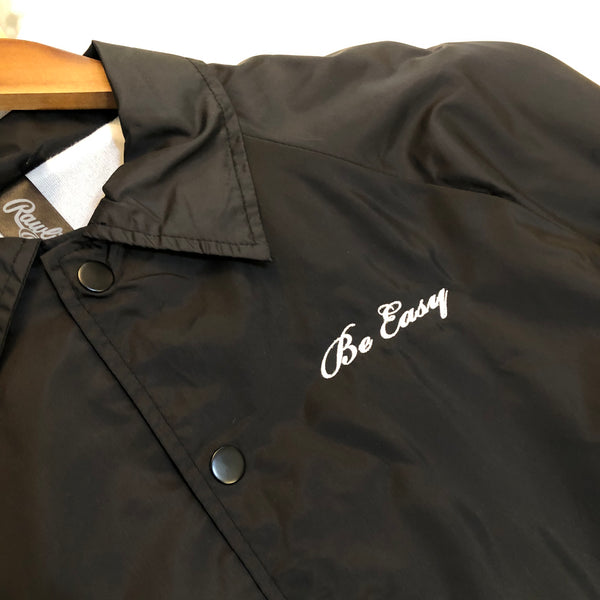 black windbreaker