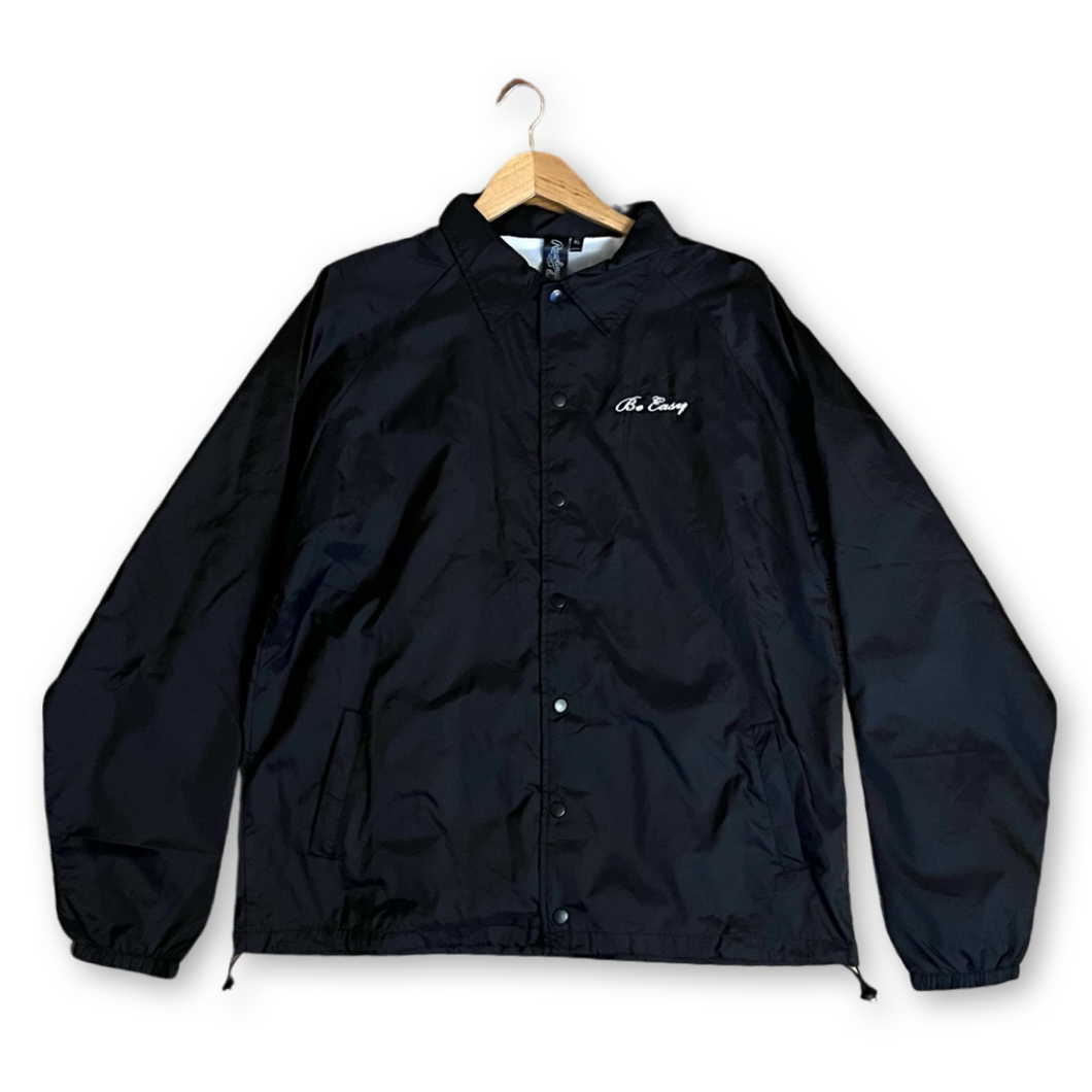 black windbreaker